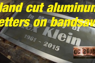 DC. Hand cut aluminum letters name plaque