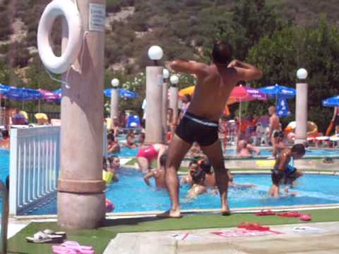 Turkish man dancing by pool (pt